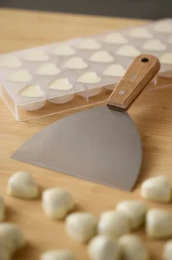 Blomsterbergs chokladskrapa, Ek-rostfritt stål